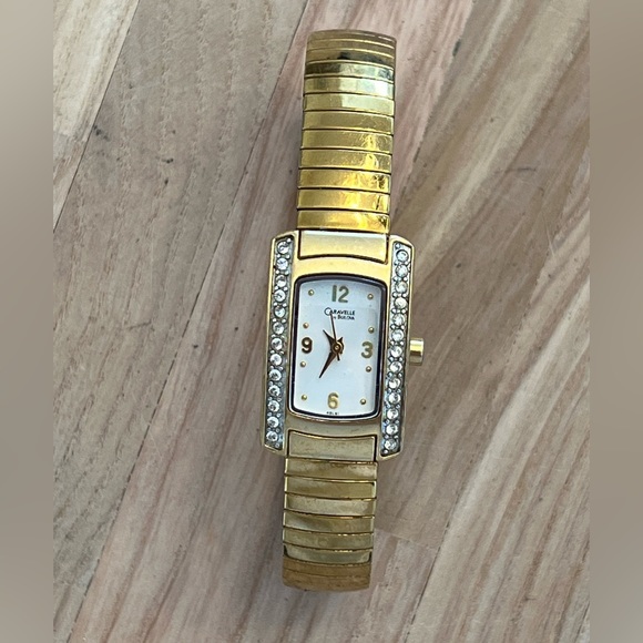 Caravelle by Bulova Ladies Watch Crystals White Dial Gold Tone